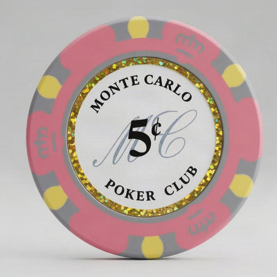A round 5-cent Monte Carlo poker chip with a pink outer rim, yellow accents, a gray inner ring, and a glittery gold center border surrounding a white center with black text and a silver 'MC' monogram.
